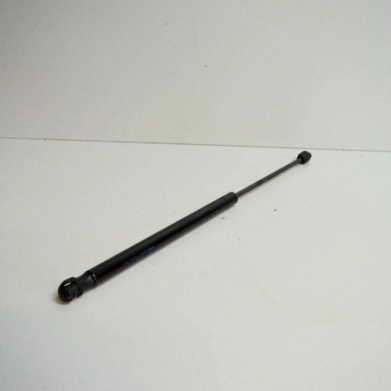 Siłownik (sprężyna gazowa) klapy bagażnika 1Q0827550B