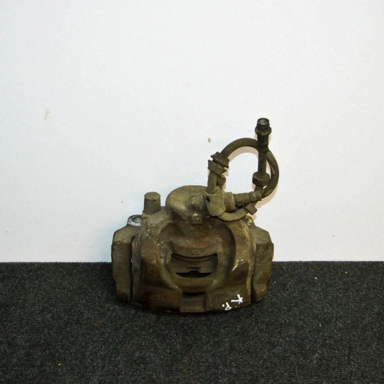 Front brake caliper – left