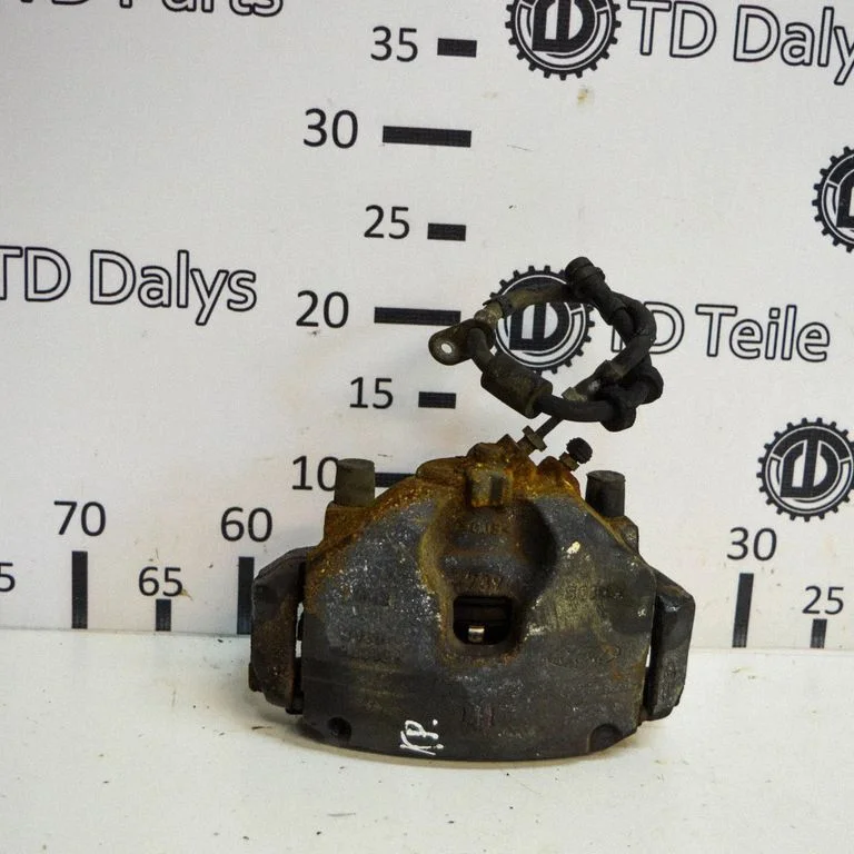 Front brake caliper – left