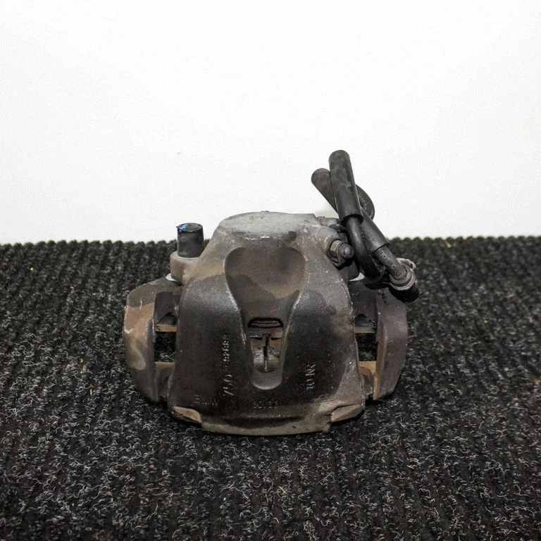 Front brake caliper – right