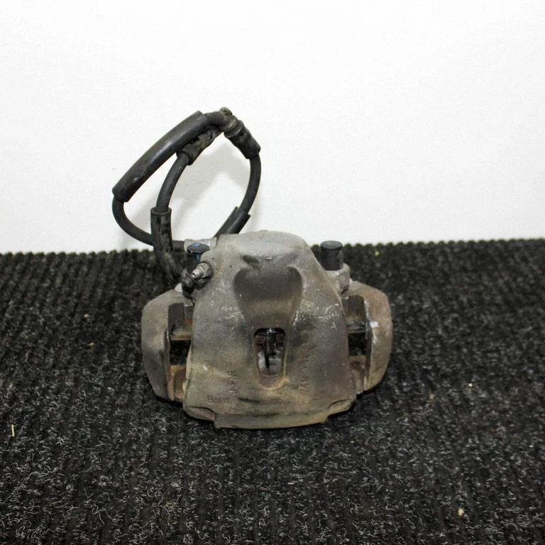 Front brake caliper – left